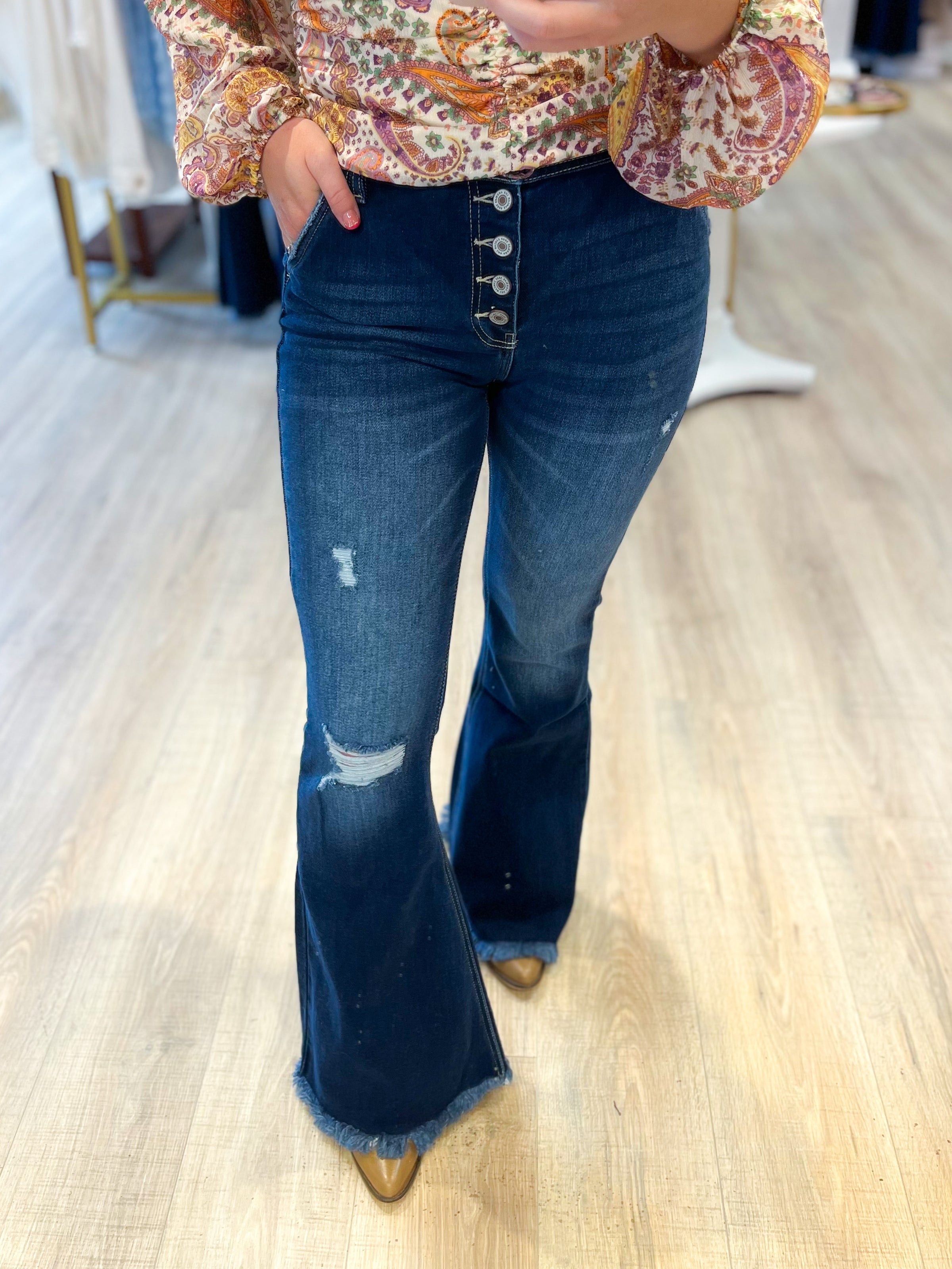 raw hem dark wash bootcut jeans