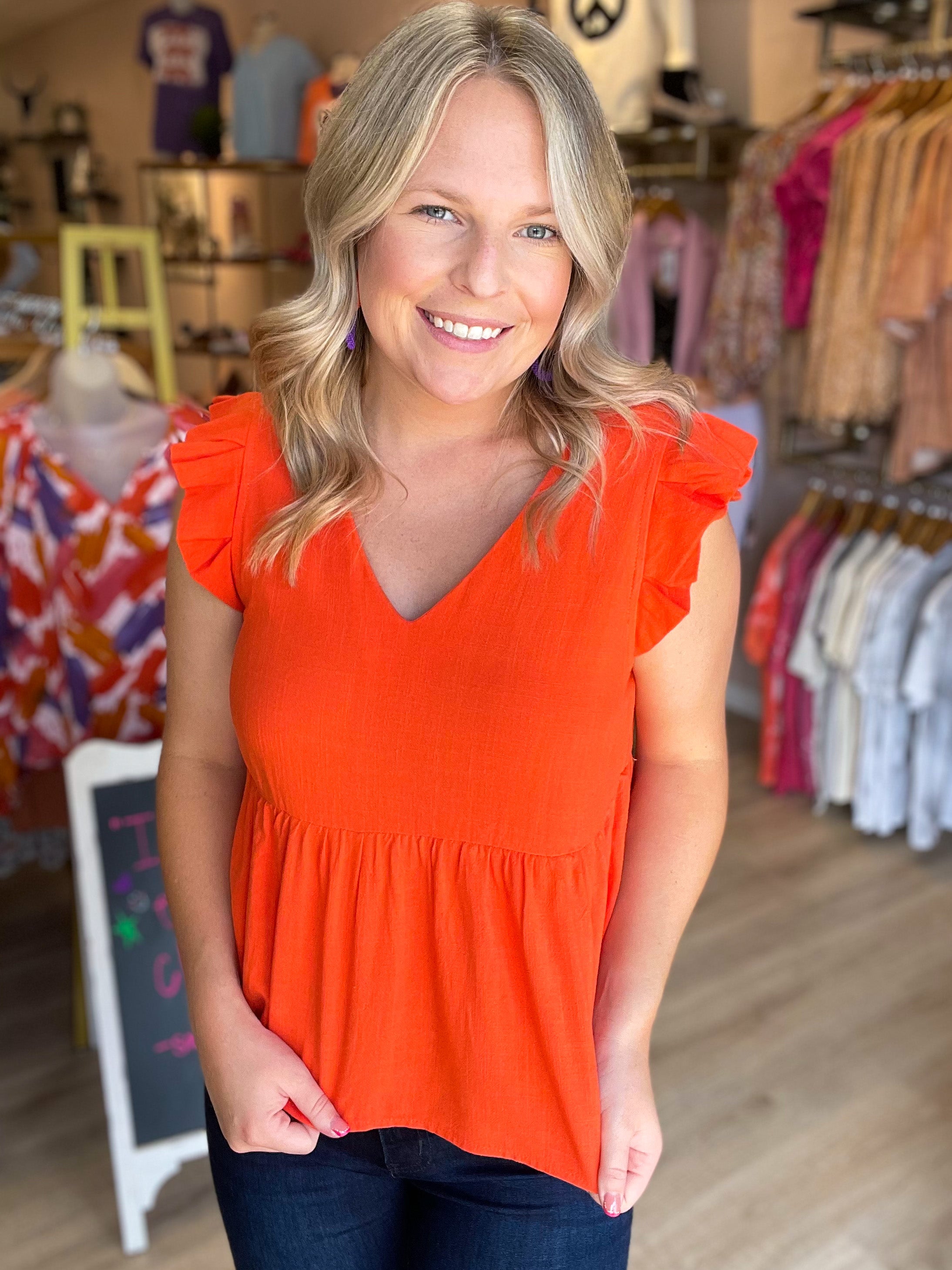 orange babydoll style top