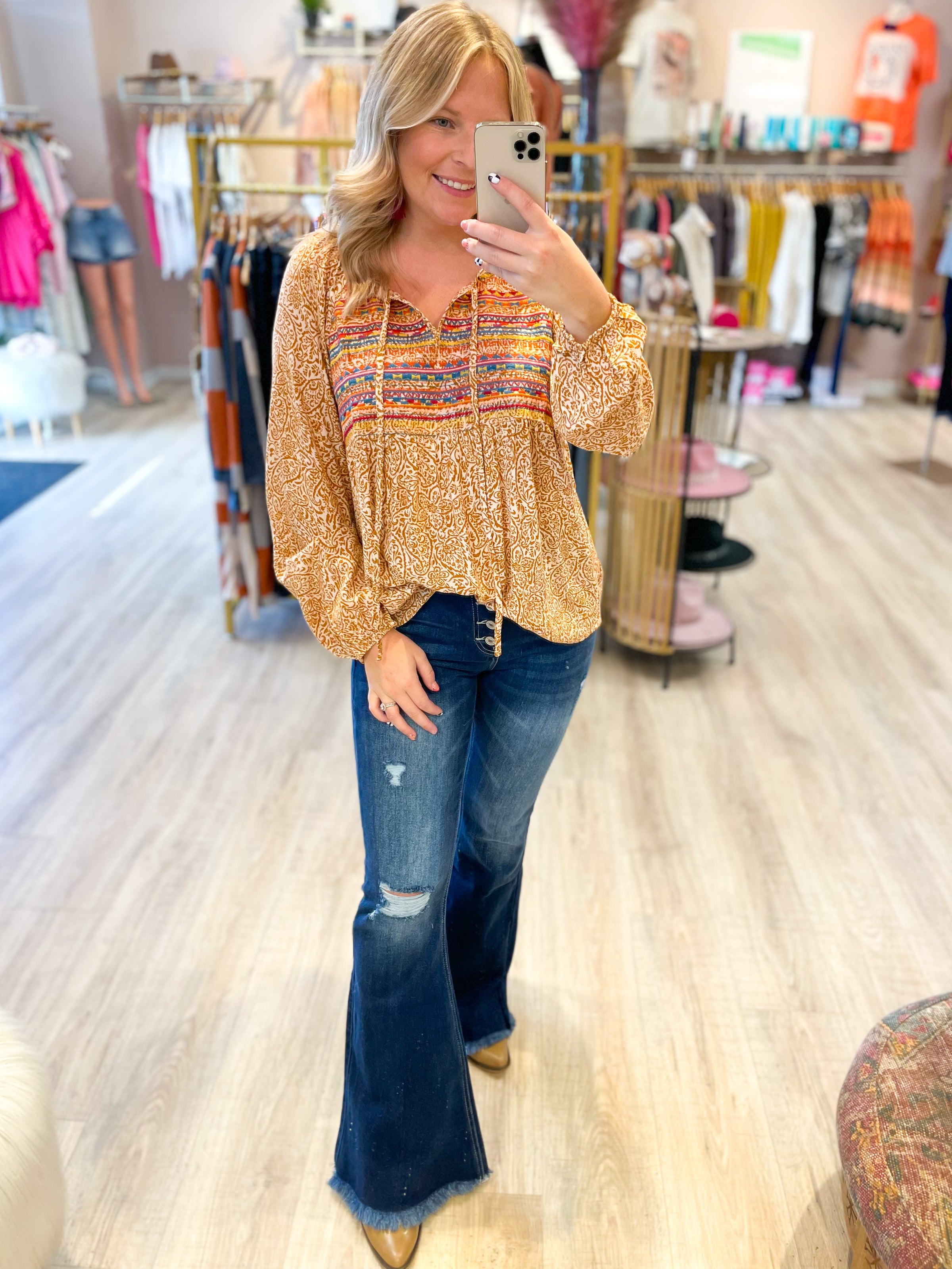 marigold pattern top with embroidered chest