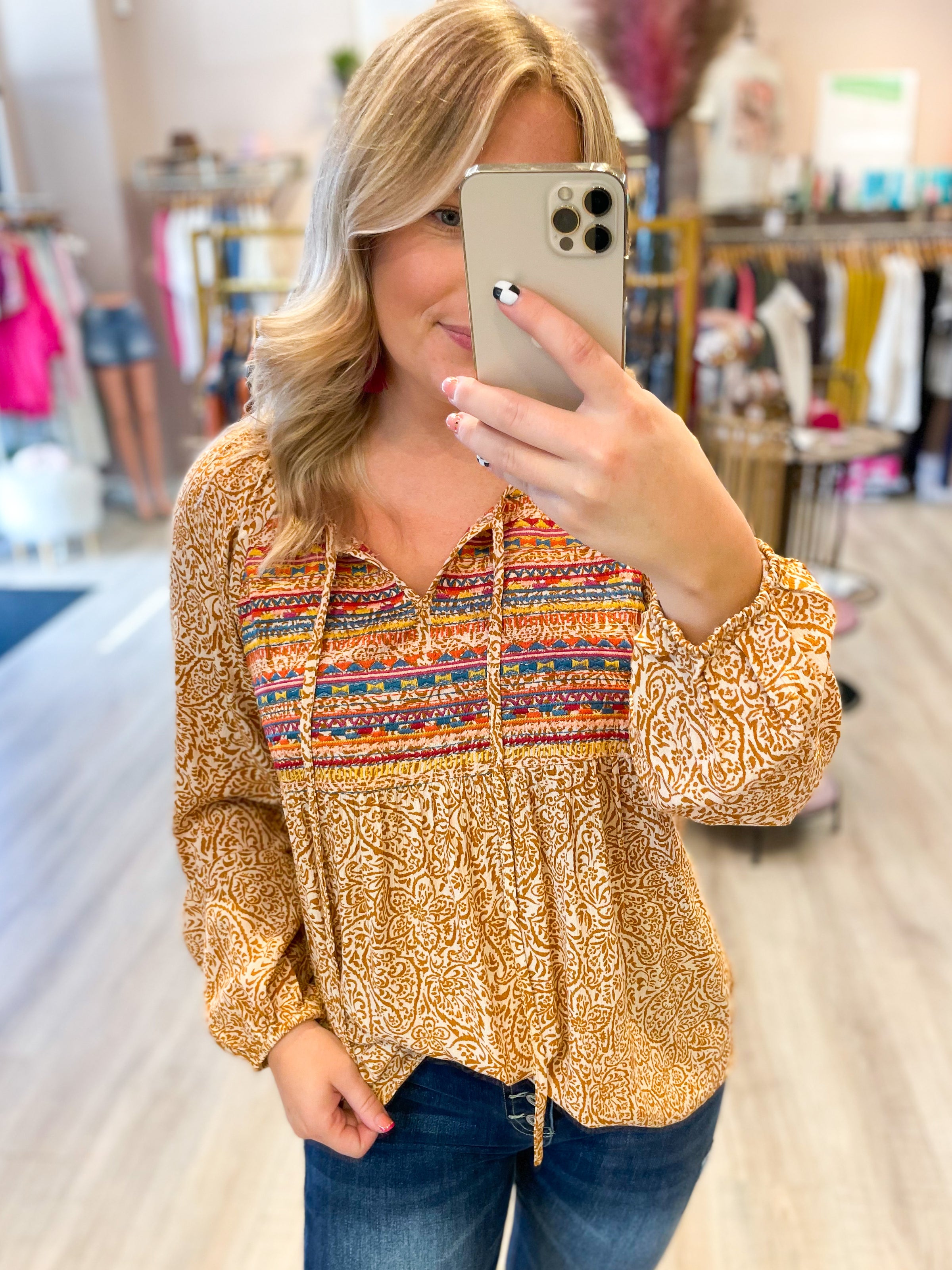 marigold pattern top with embroidered chest